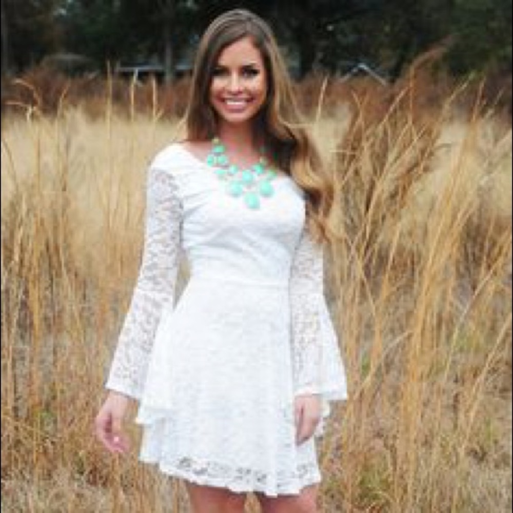 Flare sleeved white flowy dress